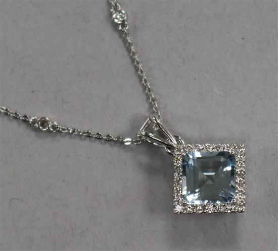A modern white metal, aquamarine and diamond set square cluster pendant, on a gem set 18ct white gold chain, 16mm.